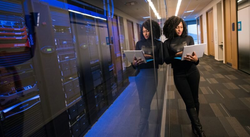 Person migrating a website on a laptop at a desk